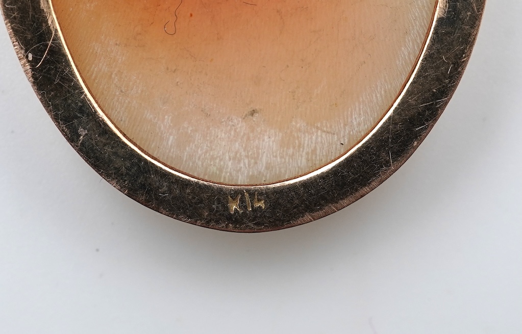 A collection of cultured pearl jewels and a cameo pendant